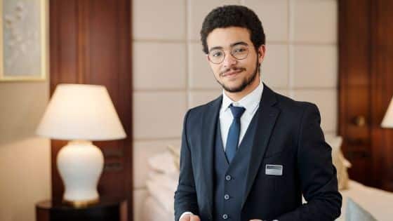 Hotel staff welcoming guests at the front desk